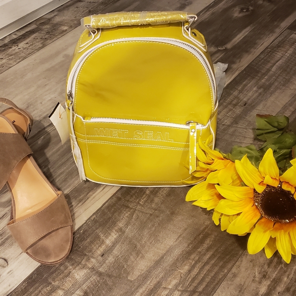 12 inch vinyl backpack